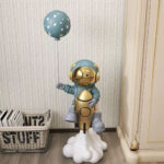 The Astronaut Holding a Balloon photo review