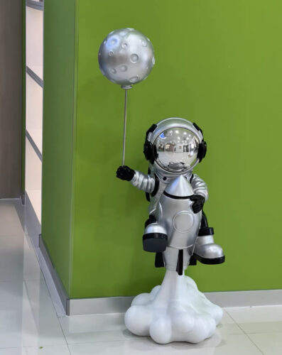 The Astronaut Holding a Balloon photo review